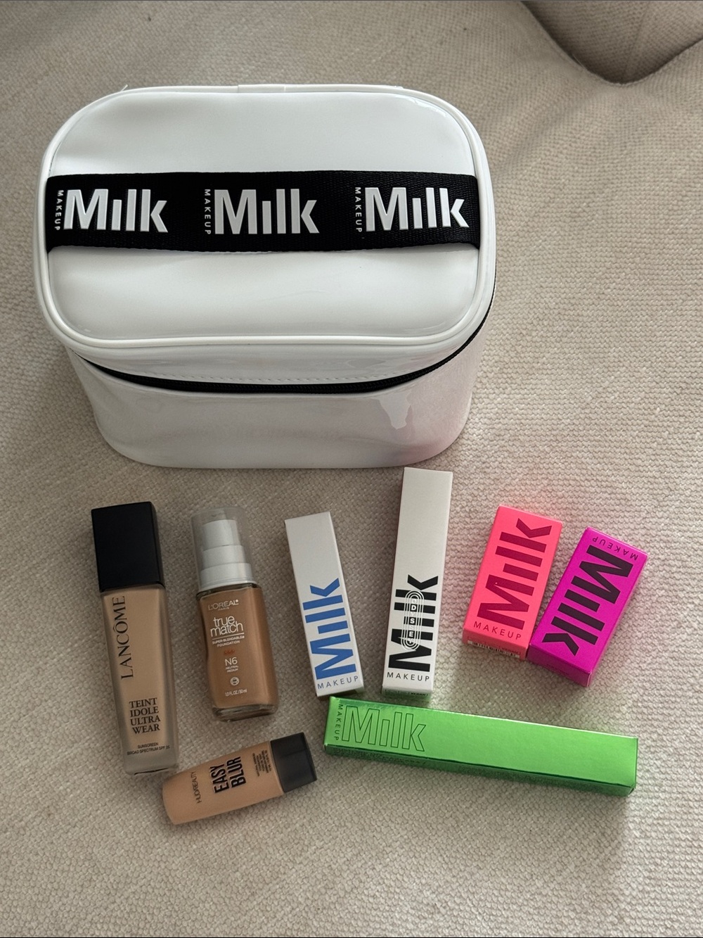 Milk Makeup White Case with Assorted Milk Makeup Boxes